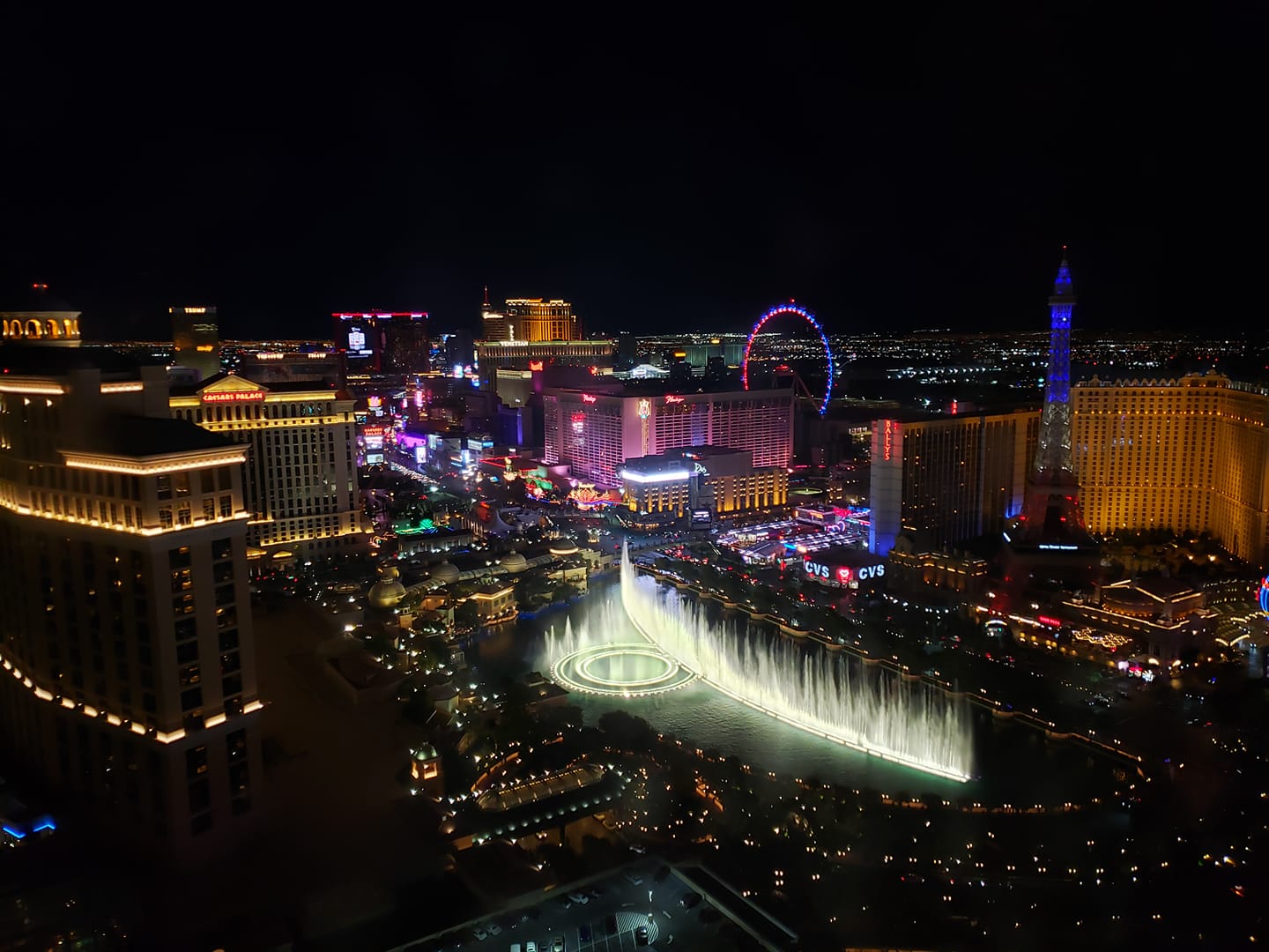 A view of the Las Vegas strip at night with the Bellagio fountains